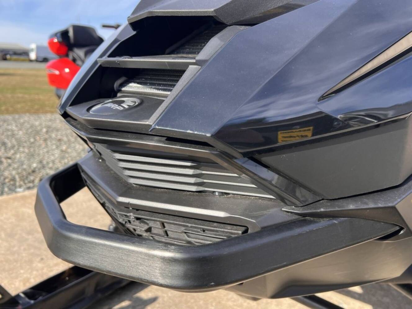 A photo of this 2025 Ski-Doo Renegade® X-RS® 900 ACE Turbo R Ice R. XT 1.5 Std_7.2