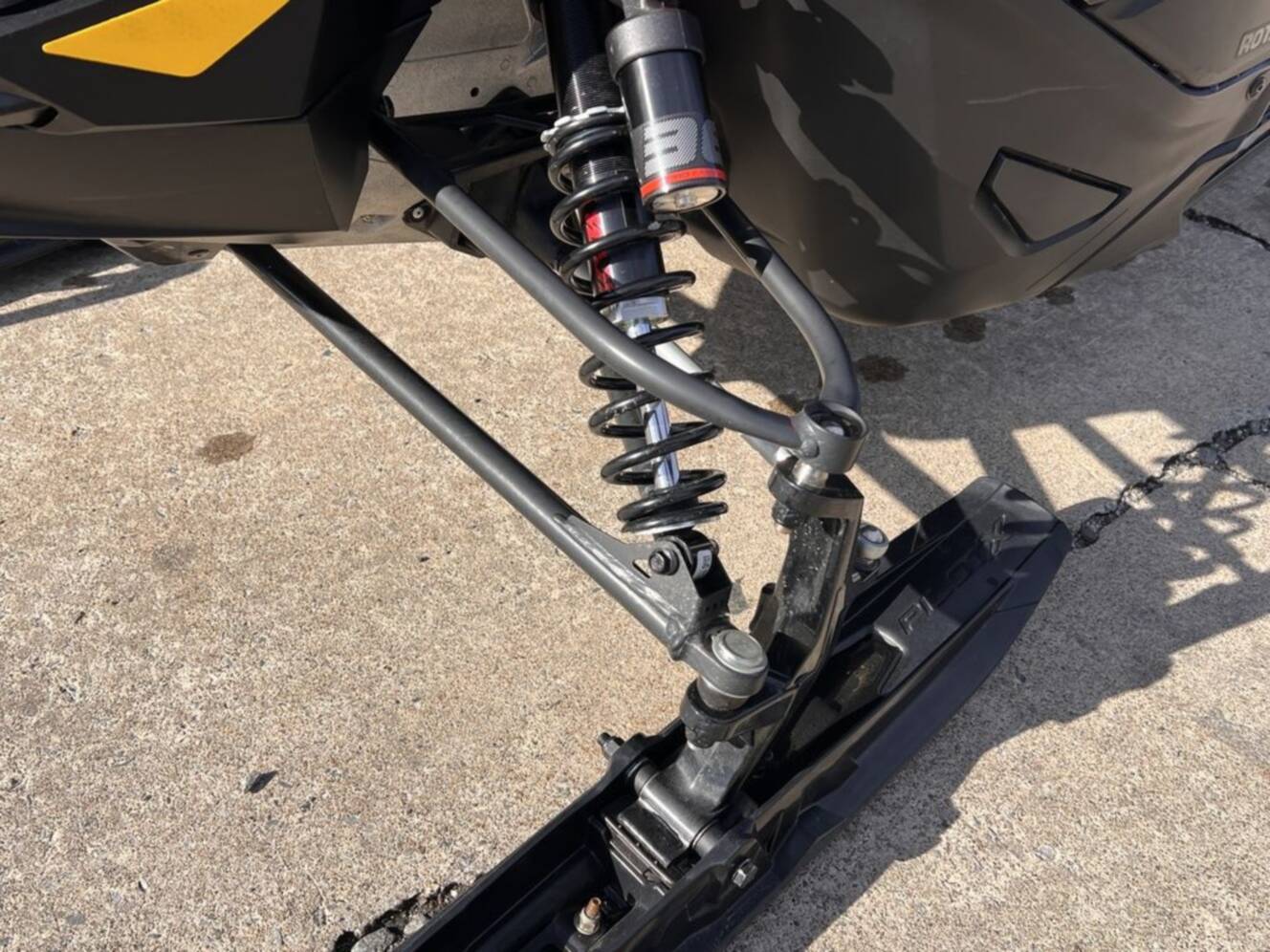 A photo of this 2025 Ski-Doo Renegade® X-RS® 900 ACE Turbo R Ice R. XT 1.5 Std_7.2