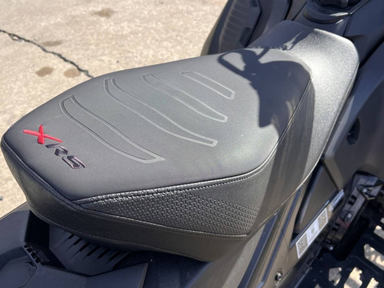 A photo of this 2025 Ski-Doo Renegade® X-RS® 900 ACE Turbo R Ice R. XT 1.5 Std_7.2