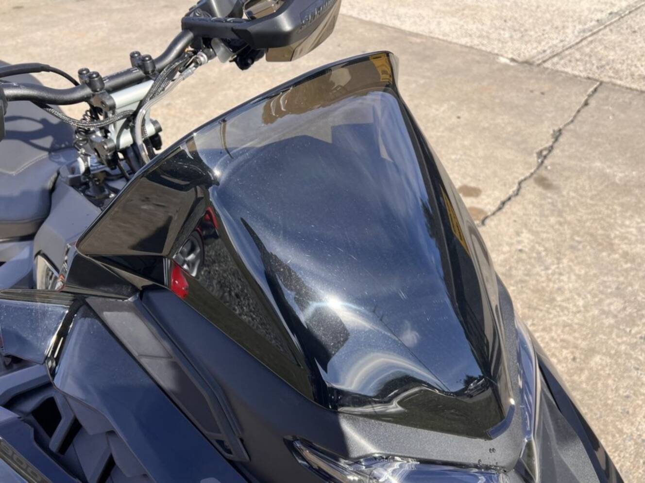 A photo of this 2025 Ski-Doo Renegade® X-RS® 900 ACE Turbo R Ice R. XT 1.5 Std_7.2
