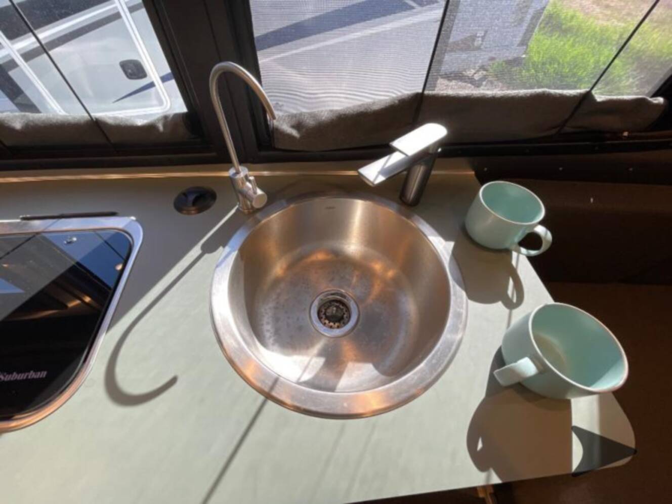 A photo of this 2025 Airstream REI Special Edition Basecamp 20X
