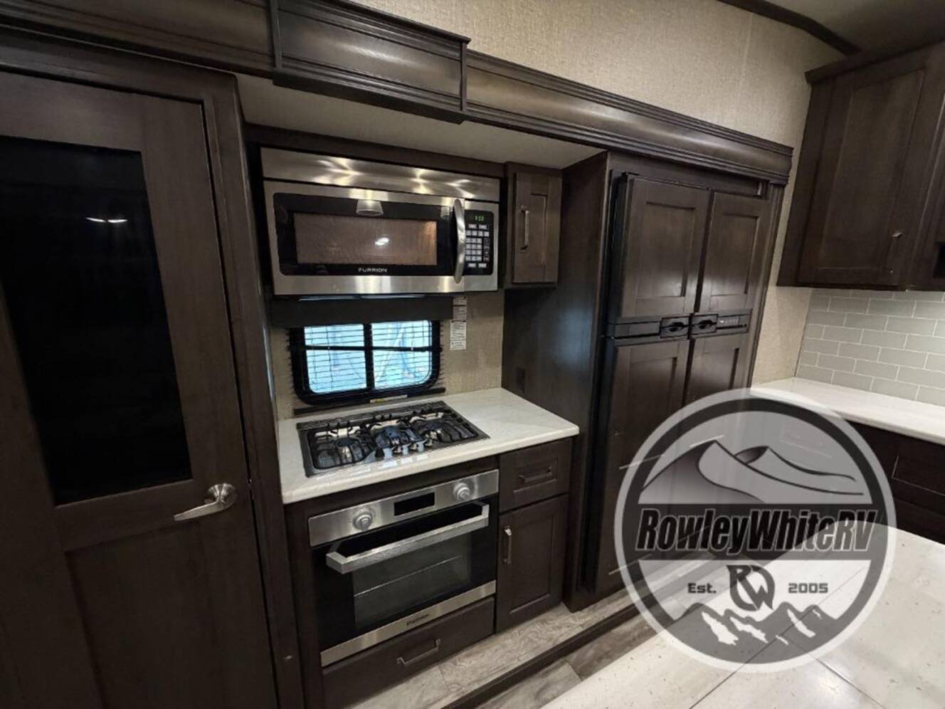 A photo of this 2021 Grand Design Reflection 303RLS