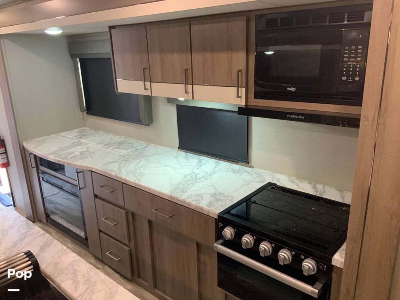 A photo of this 2023 Grand Design Imagine 2670MK
