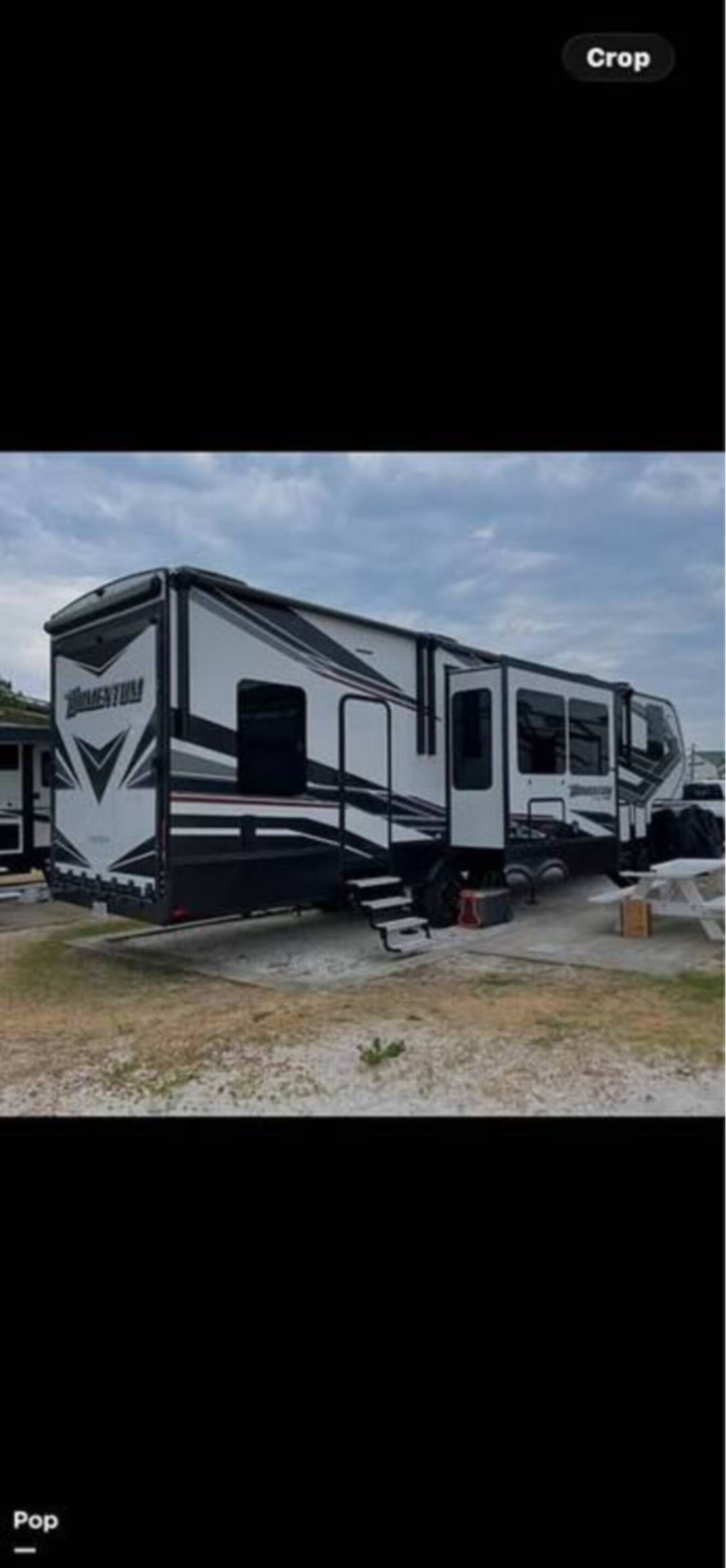 A photo of this 2022 Grand Design Momentum 351M