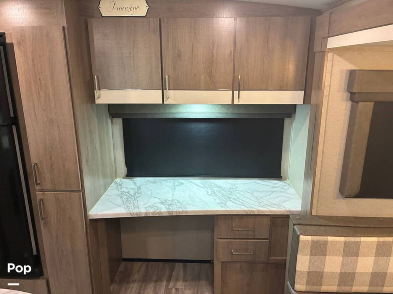 A photo of this 2023 Grand Design Imagine 2670MK