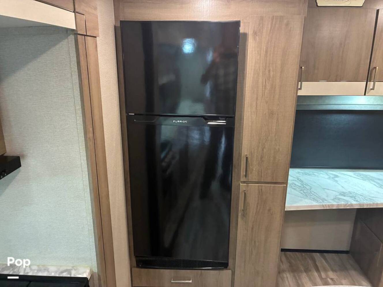A photo of this 2023 Grand Design Imagine 2670MK