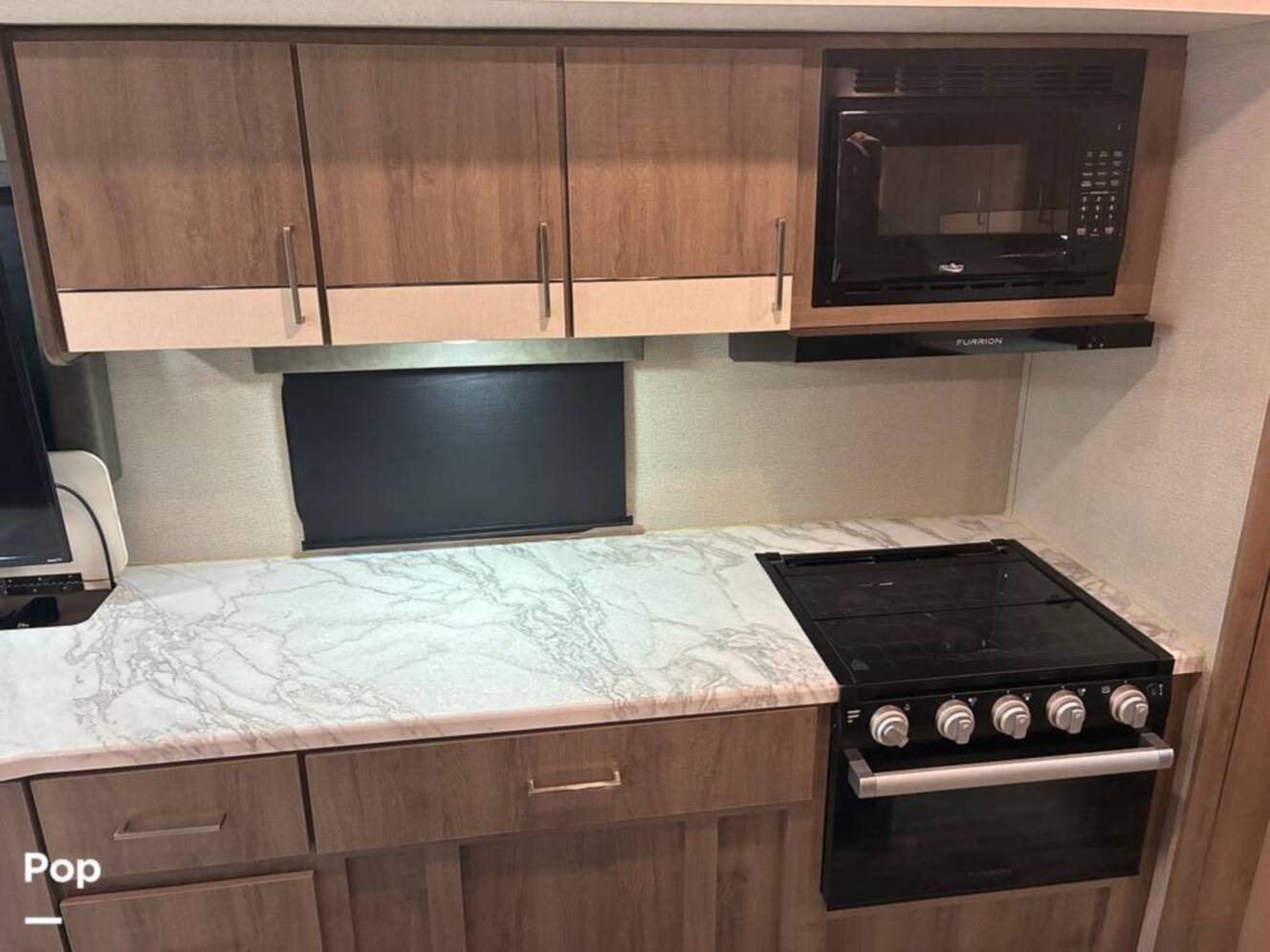 A photo of this 2023 Grand Design Imagine 2670MK