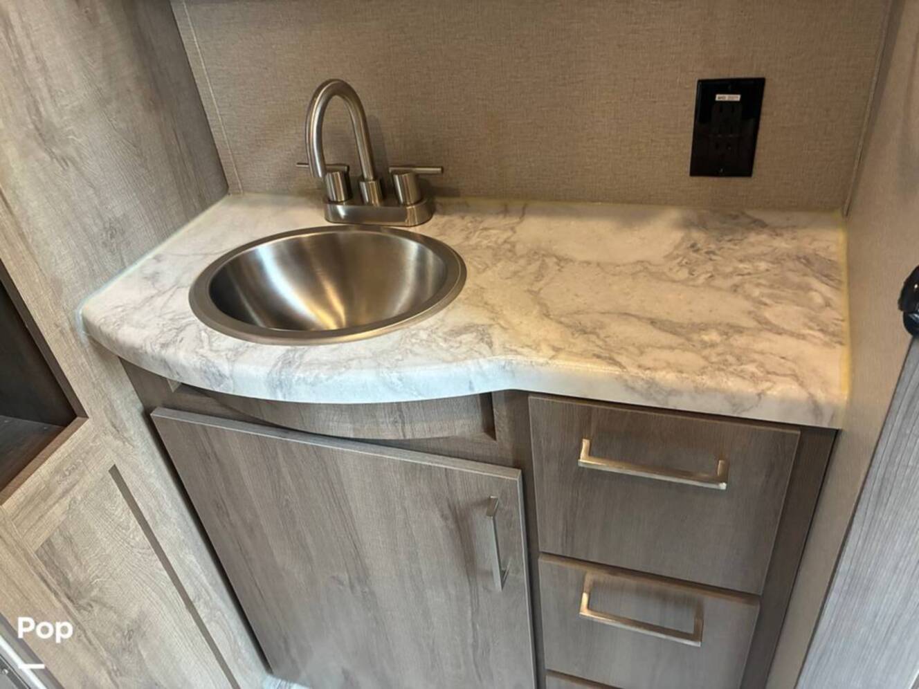 A photo of this 2023 Grand Design Imagine 2670MK