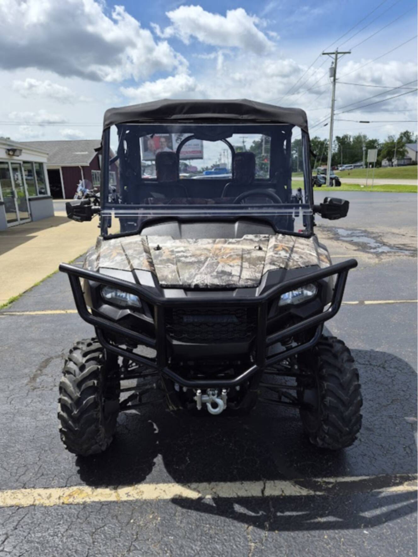 A photo of this 2025 Honda PIONEER 700 FOREST Deluxe