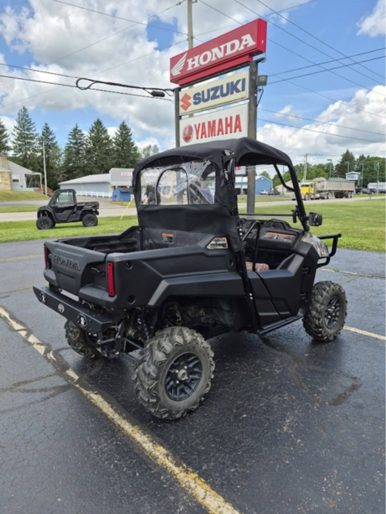 A photo of this 2025 Honda PIONEER 700 FOREST Deluxe