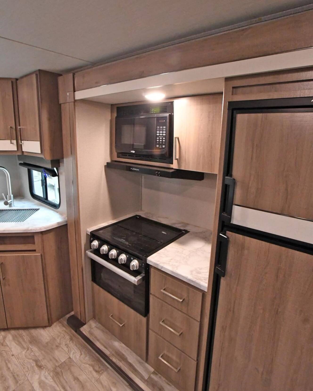 A photo of this 2022 Grand Design IMAGINE XLS 22MLE