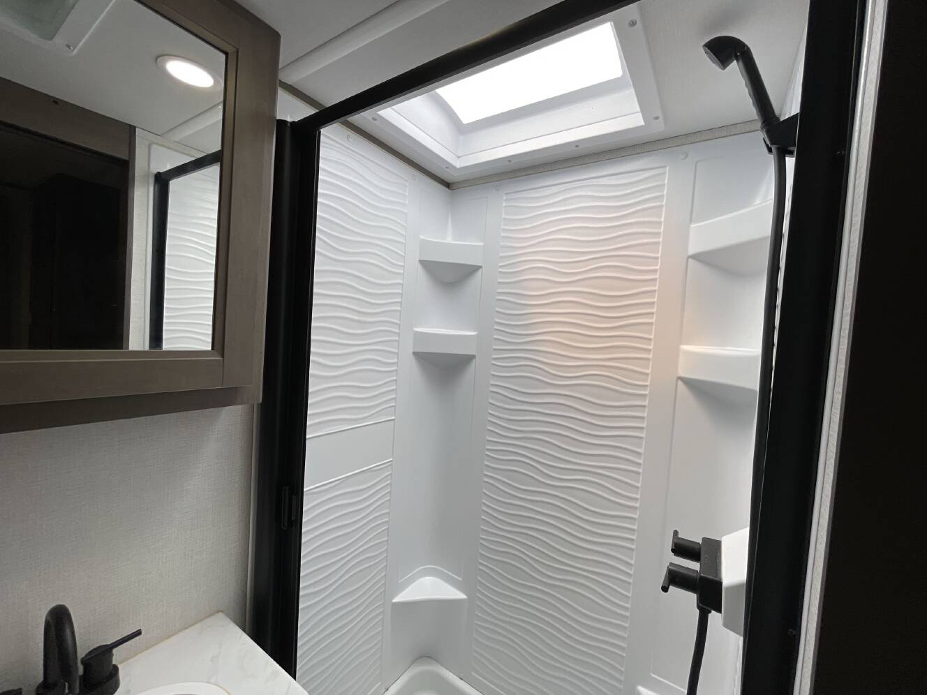 A photo of this 2026 Grand Design TRANSCEND 335BHT