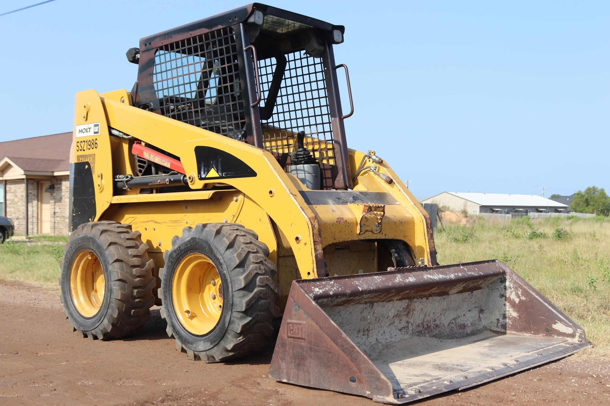 2000 CATERPILLAR 246 in Lindale, TX