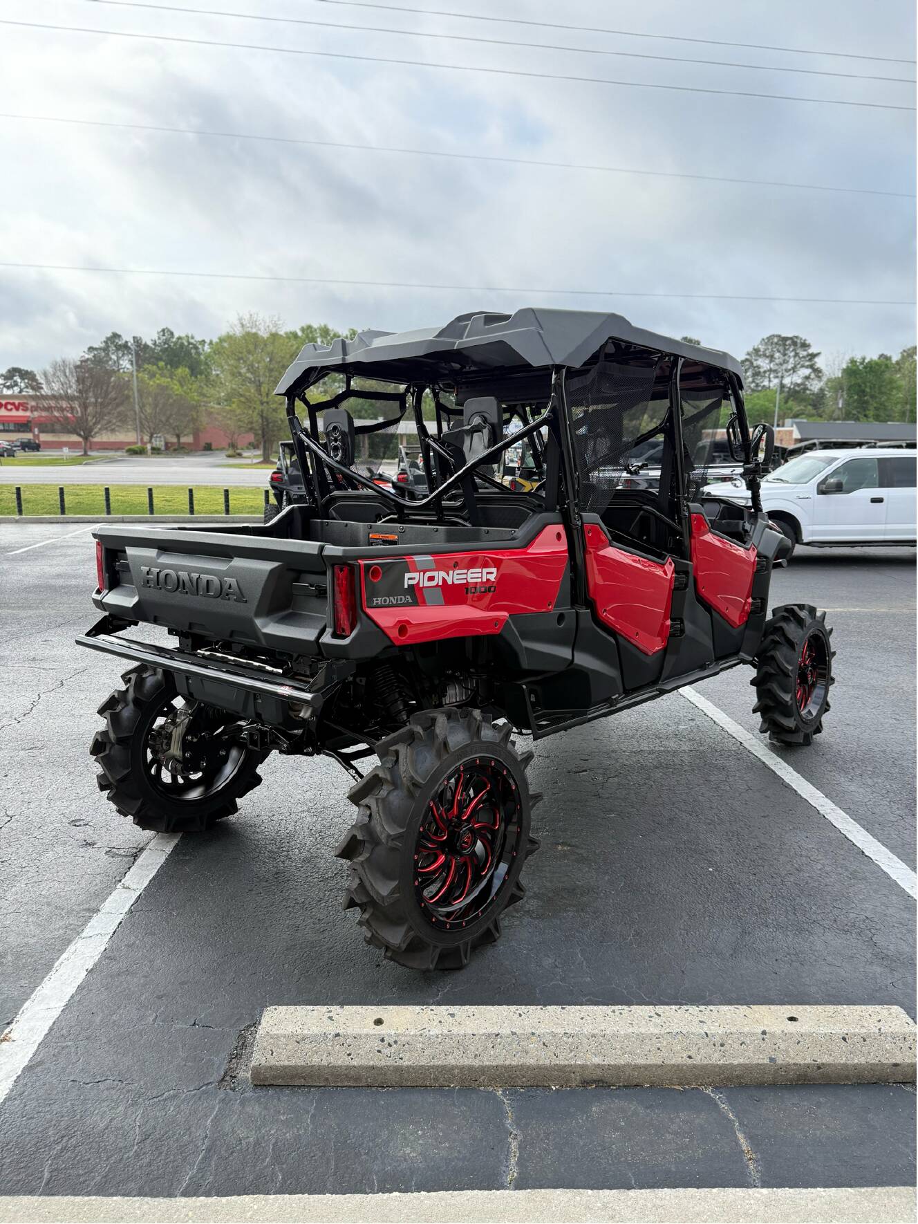 A photo of this 2025 Honda Pioneer 1000-6 Deluxe Crew