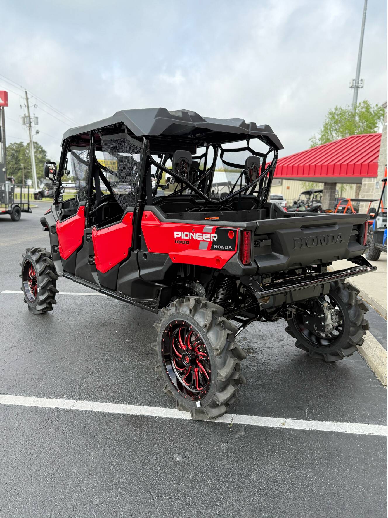 A photo of this 2025 Honda Pioneer 1000-6 Deluxe Crew