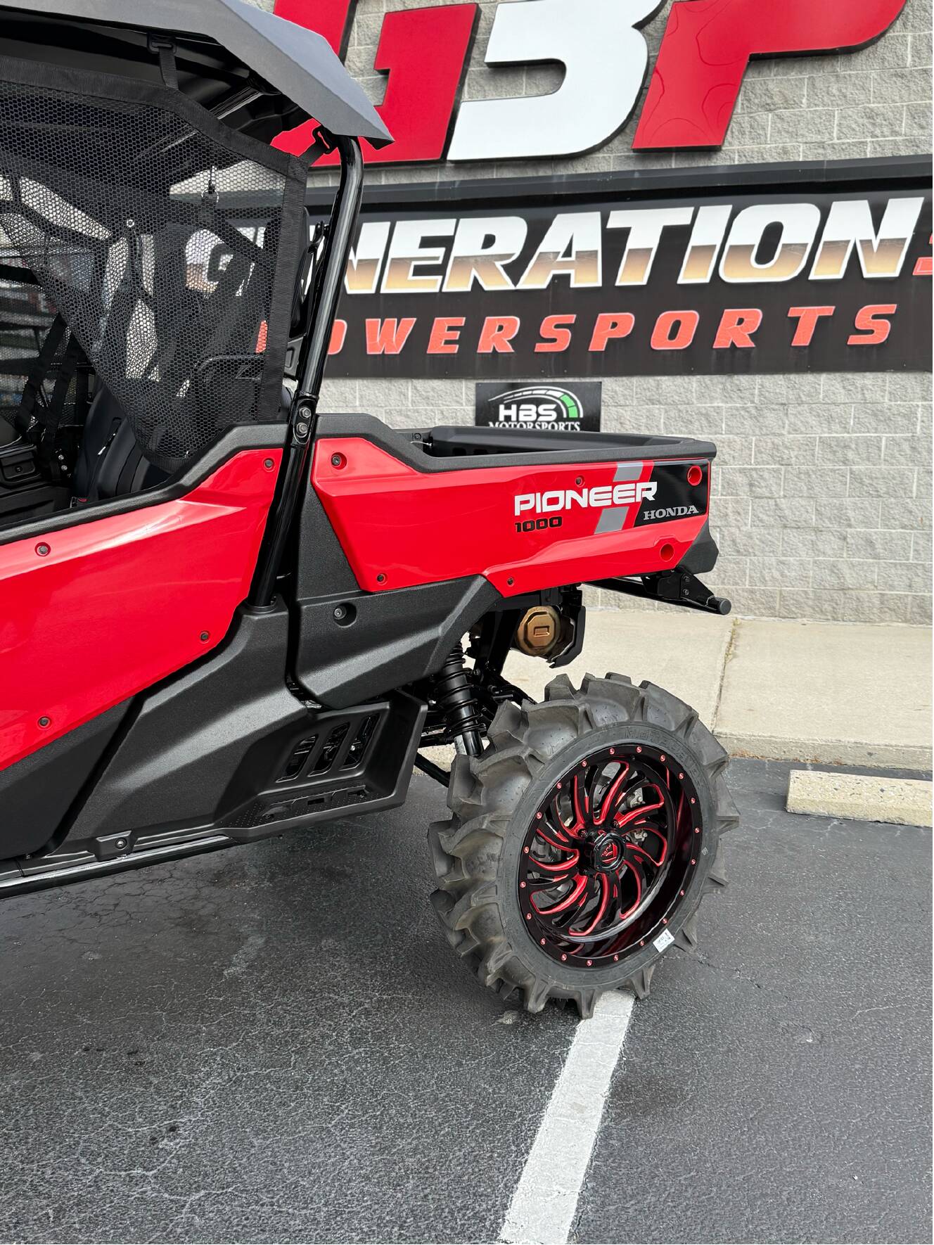 A photo of this 2025 Honda Pioneer 1000-6 Deluxe Crew