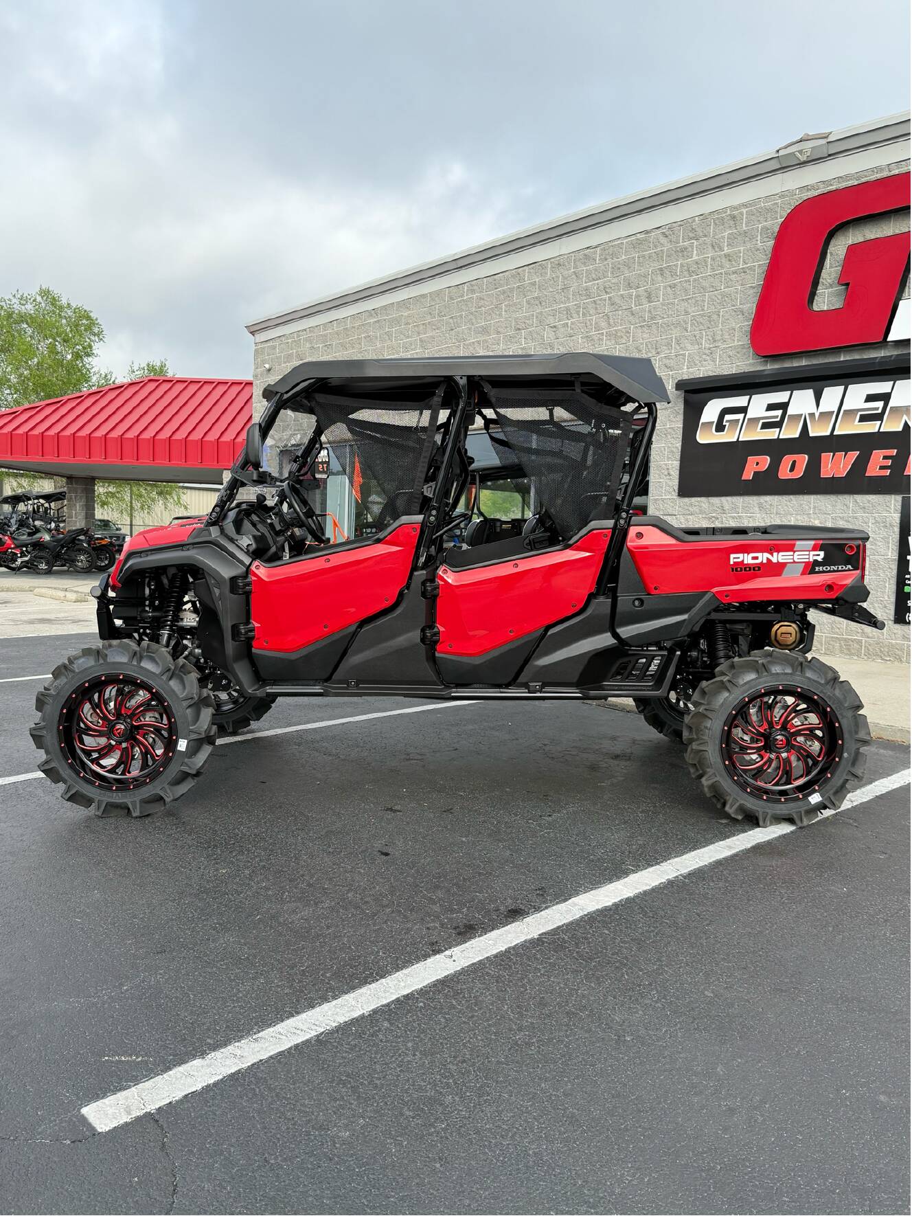 A photo of this 2025 Honda Pioneer 1000-6 Deluxe Crew