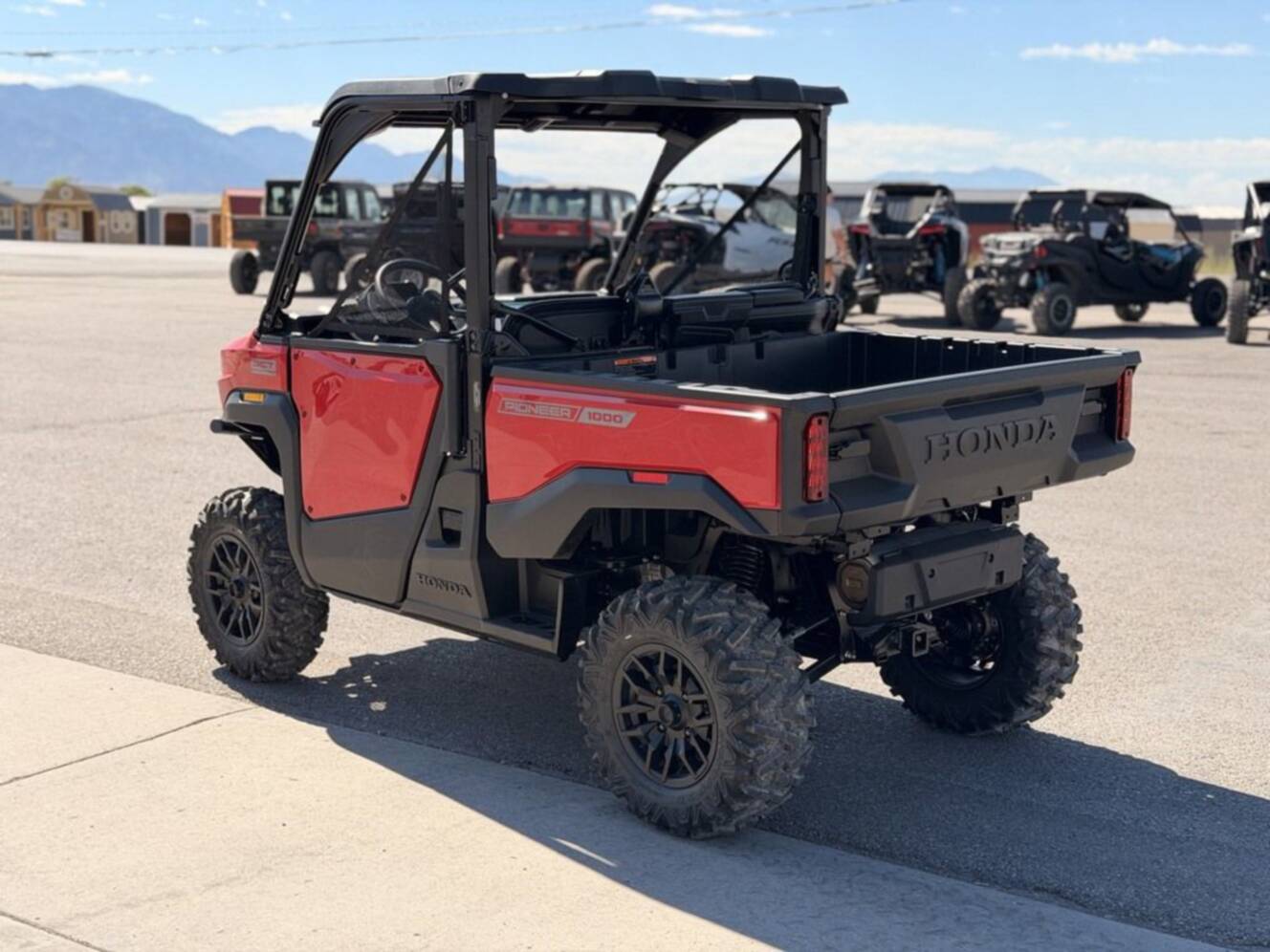 A photo of this 2026 Honda Pioneer 1000 Deluxe