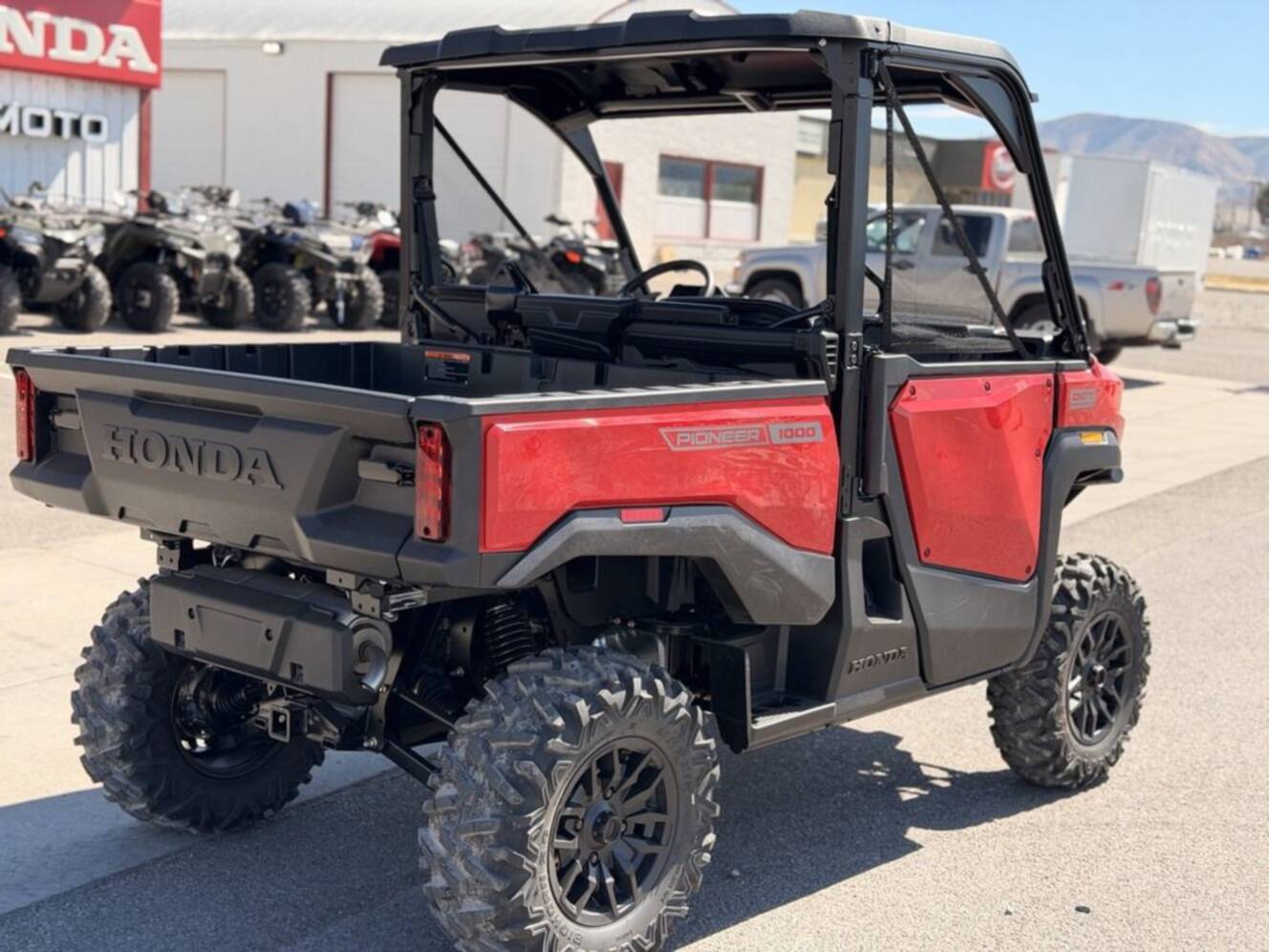 A photo of this 2026 Honda Pioneer 1000 Deluxe