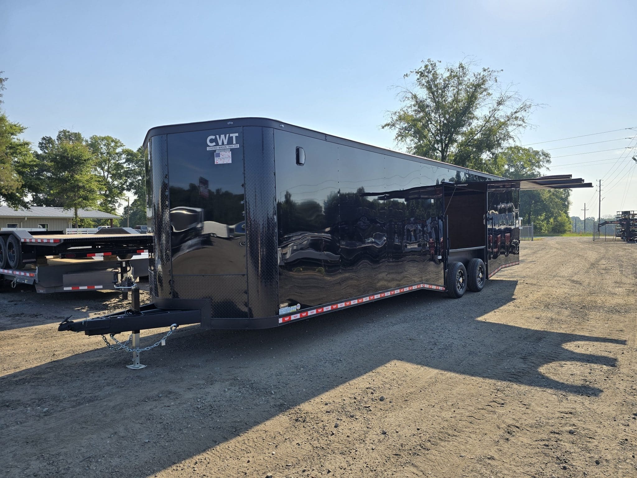 2026 Covered Wagon Trailers 8.5x32 14K Enclosed Car Hauler With Escape Door in Byron, GA