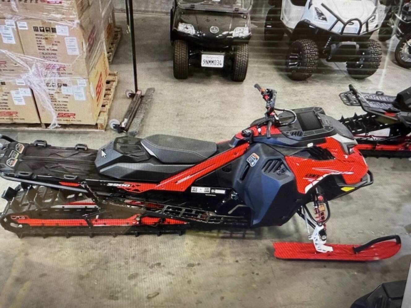 A photo of this 2026 Lynx® Shredder RE 850 E-TEC Turbo R 3900 Pow_3.0_10.25in_Red