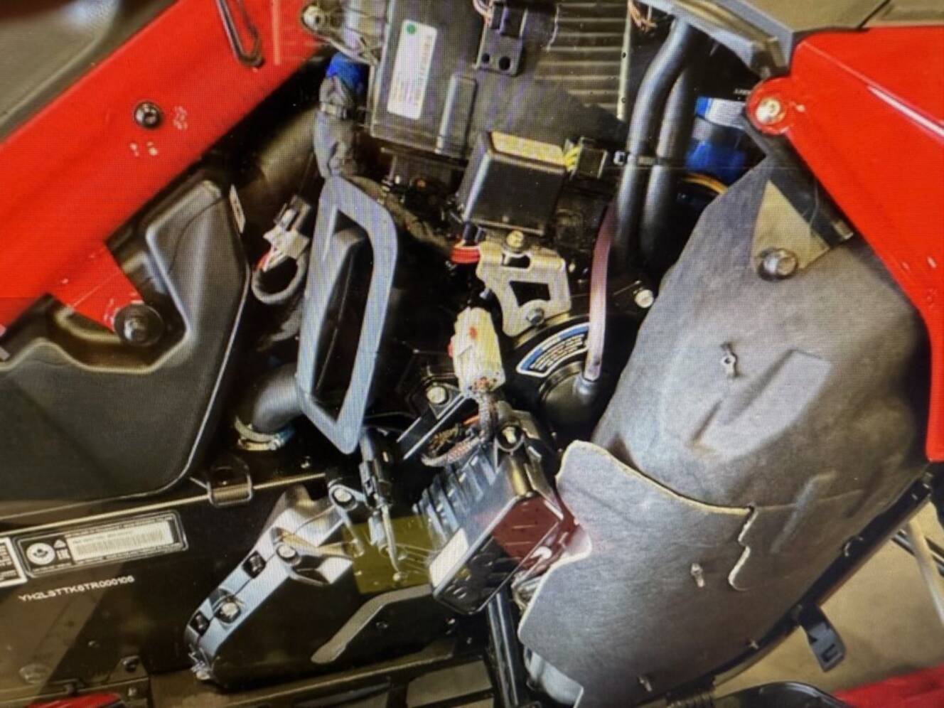 A photo of this 2026 Lynx® Shredder RE 850 E-TEC Turbo R 3700 Pow_2.5_10.25in_Red