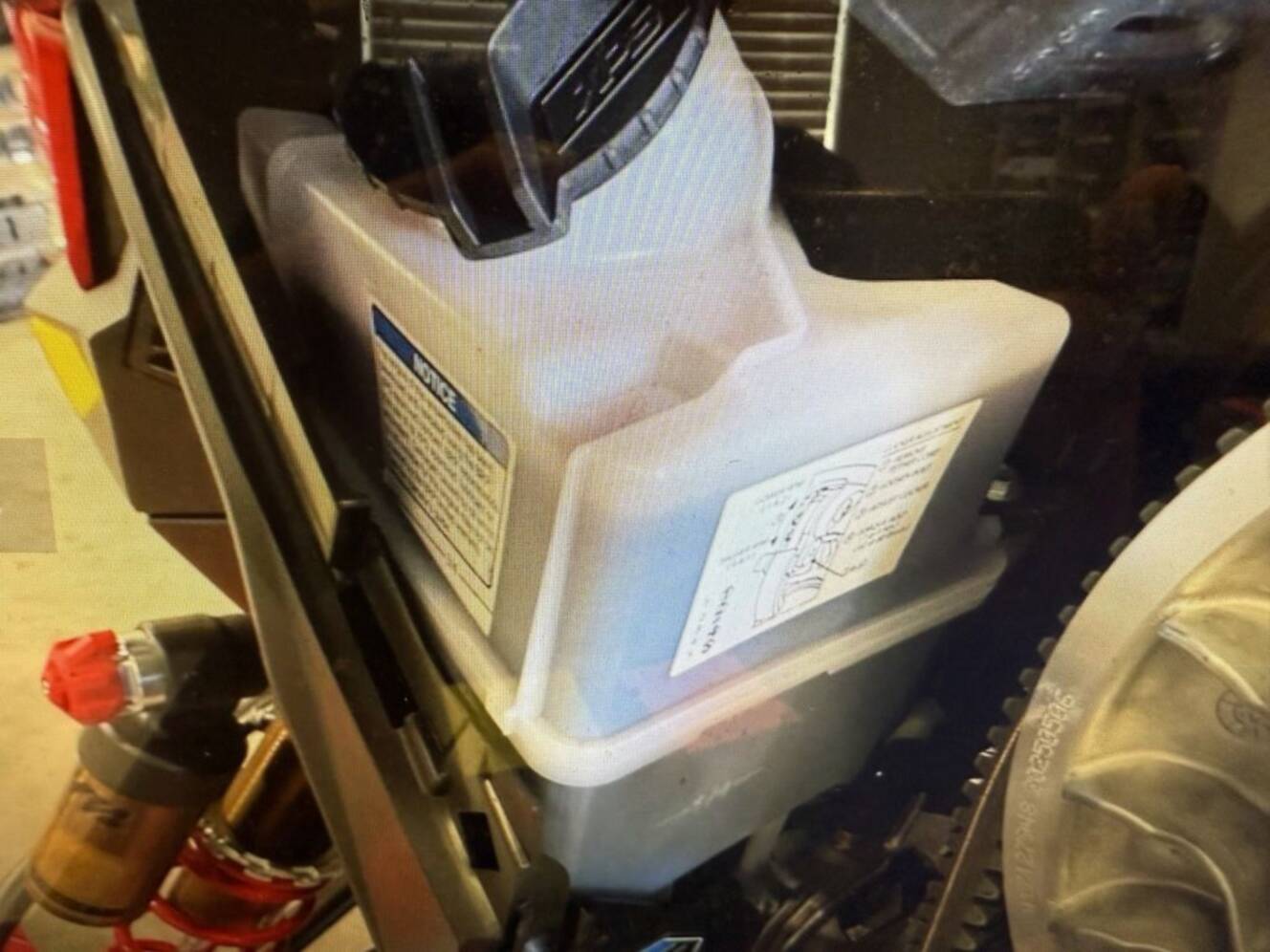 A photo of this 2026 Lynx® Shredder RE 850 E-TEC Turbo R 3700 Pow_2.5_10.25in_Red