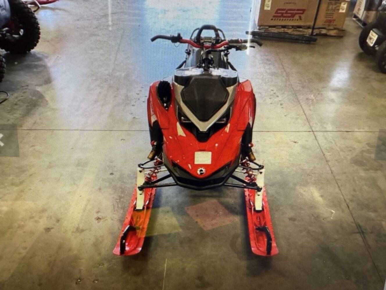 A photo of this 2026 Lynx® Shredder RE 850 E-TEC Turbo R 3700 Pow_2.5_10.25in_Red