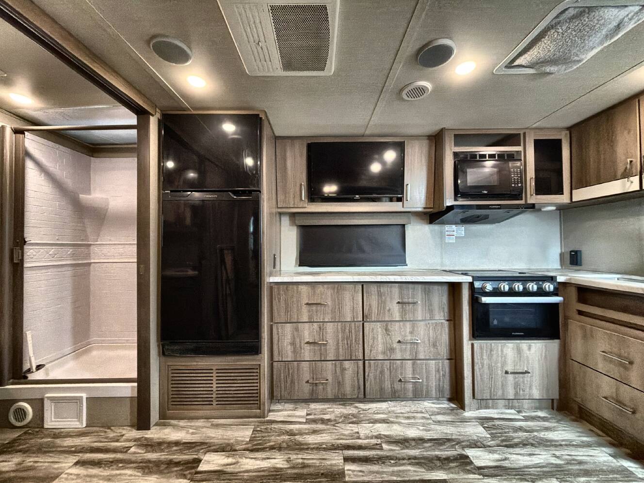 A photo of this 2022 Grand Design IMAGINE XLS 22RBE