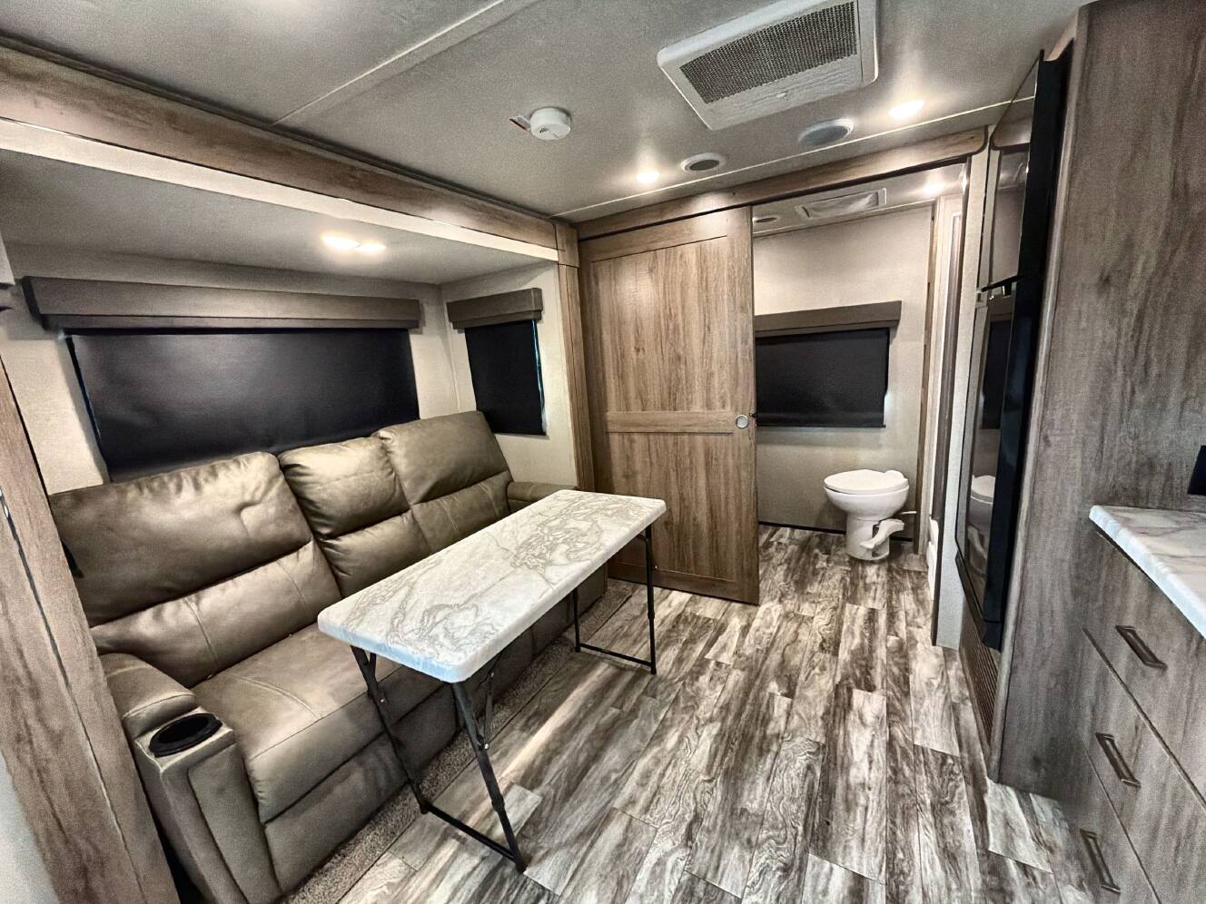 A photo of this 2022 Grand Design IMAGINE XLS 22RBE