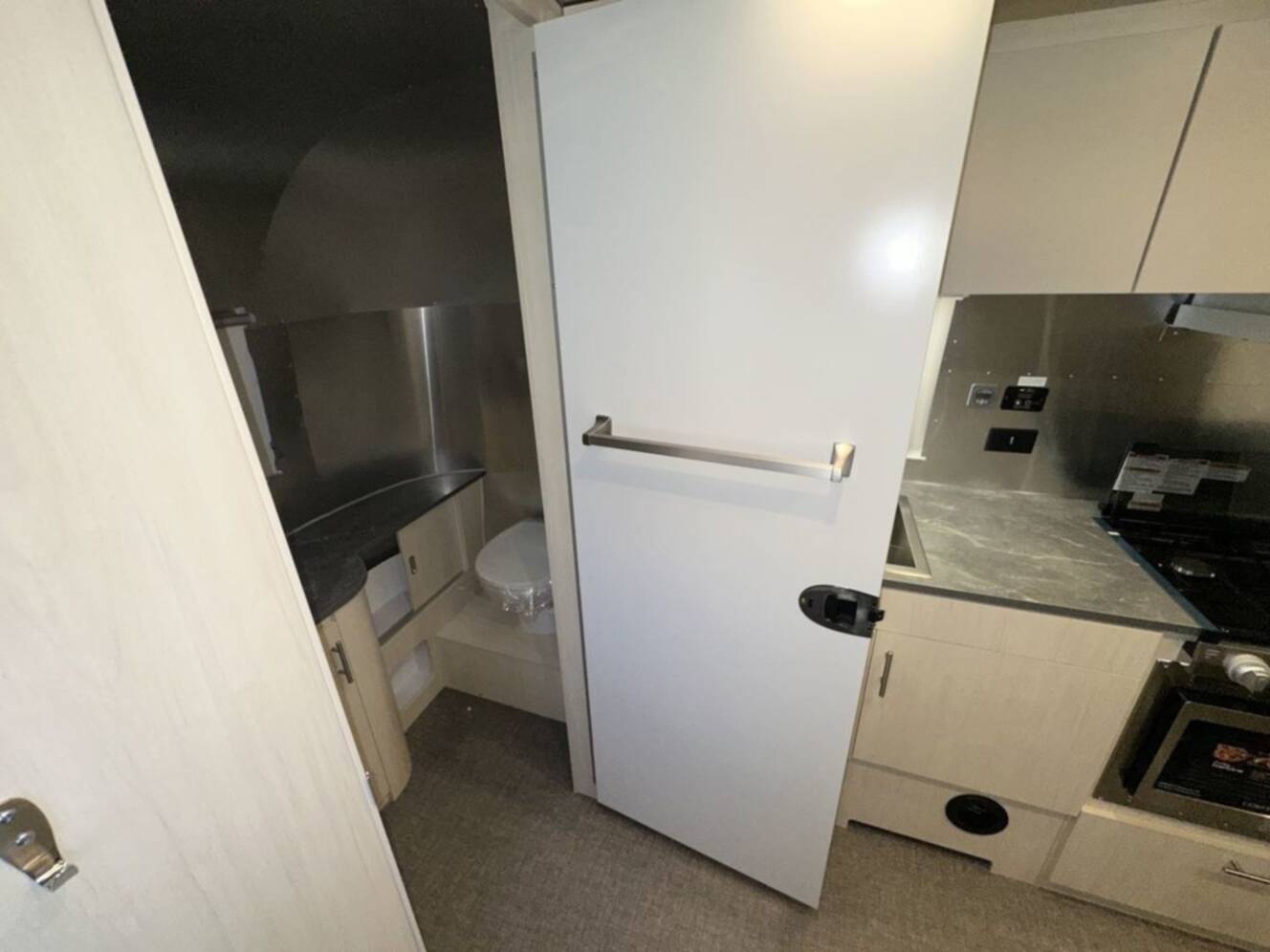 A photo of this 2025 Airstream Flying Cloud 23FBT 23FB