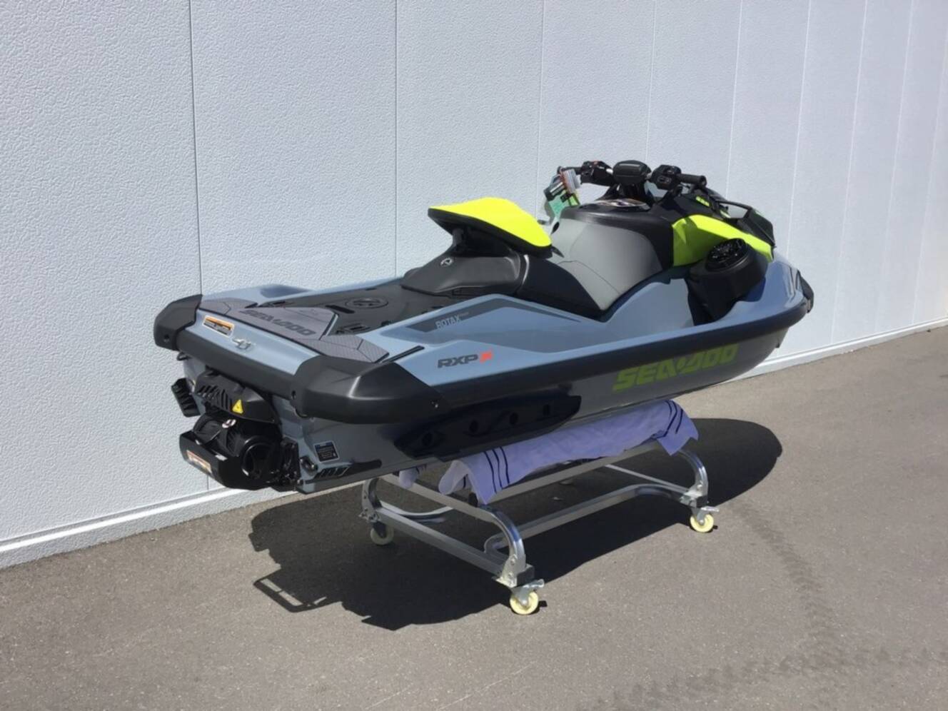 A photo of this 2026 Sea-Doo RXP-X 325 Tech, BRP Premium A, iBR Ice Metal / Manta