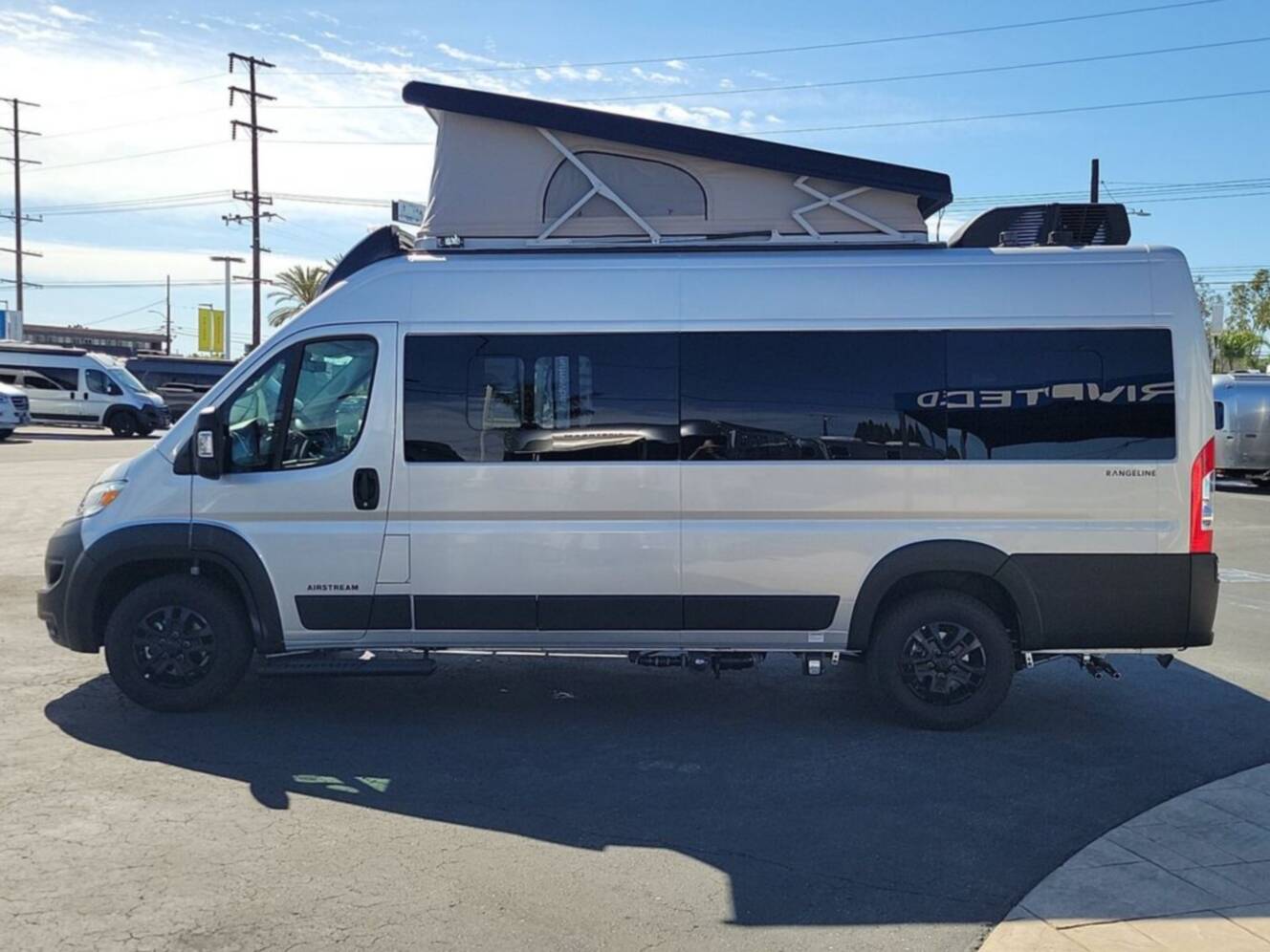A photo of this 2026 Airstream Rangeline 21 Pop Top
