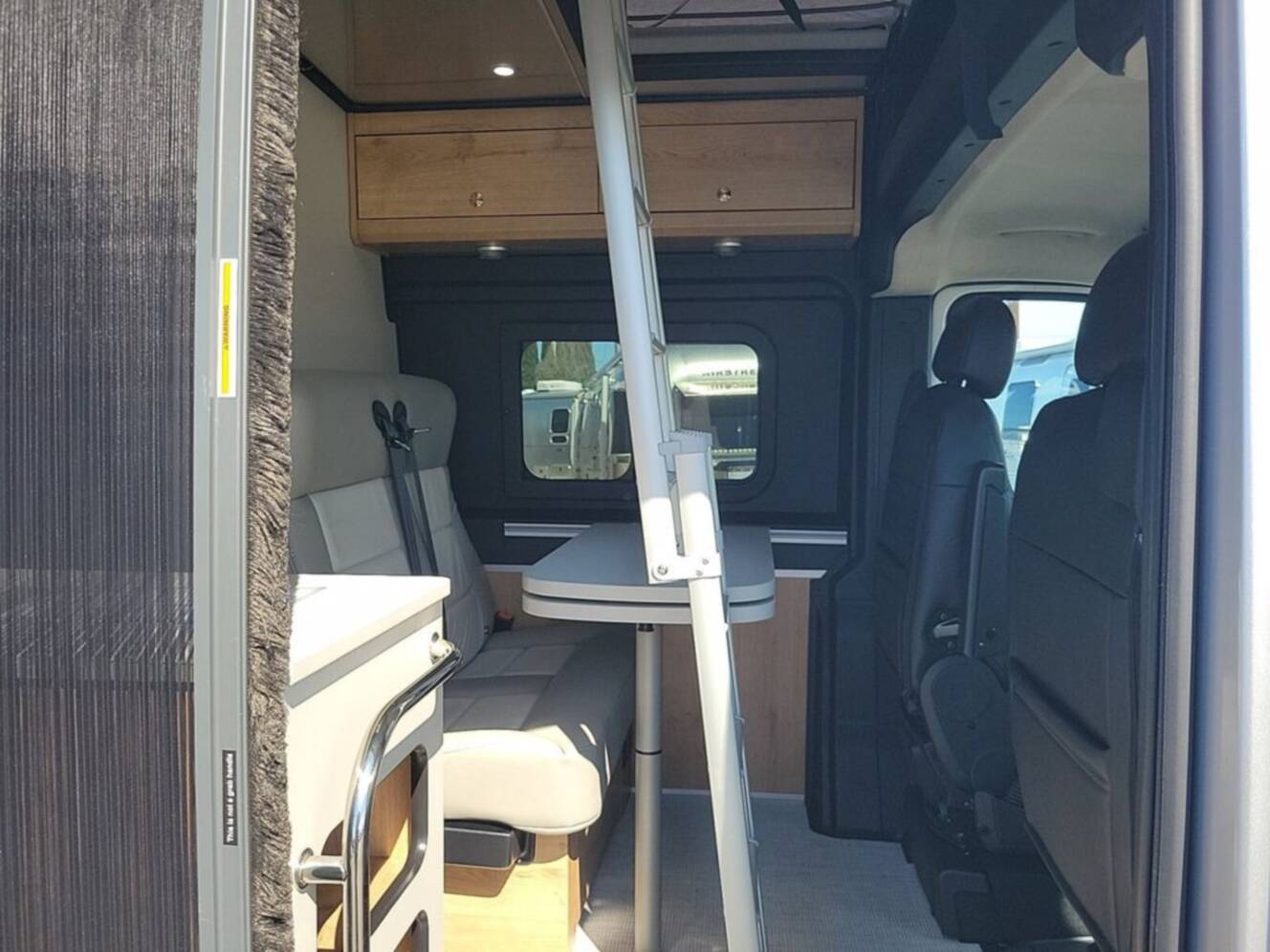 A photo of this 2026 Airstream Rangeline 21 Pop Top