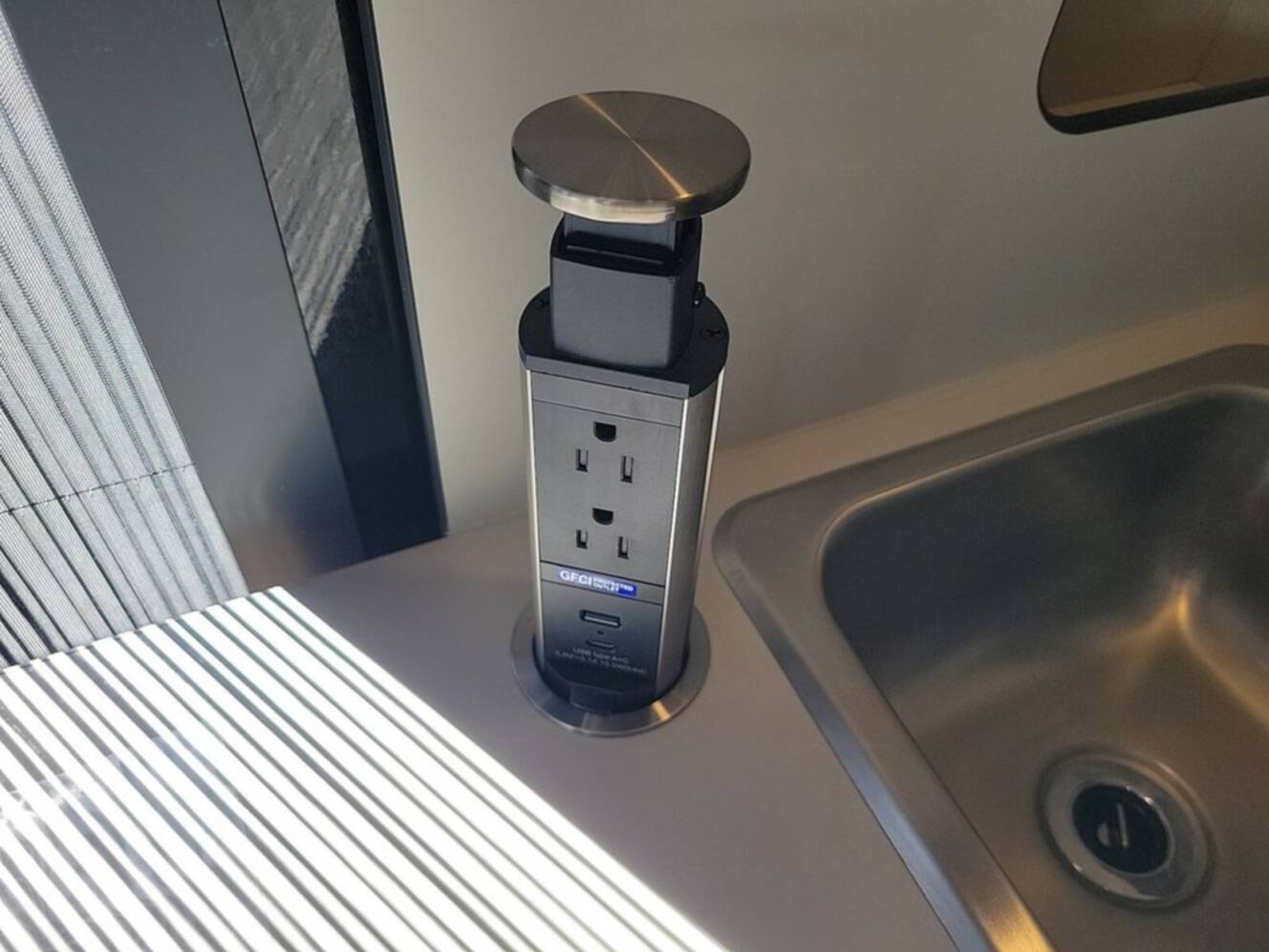 A photo of this 2026 Airstream Rangeline 21 Pop Top