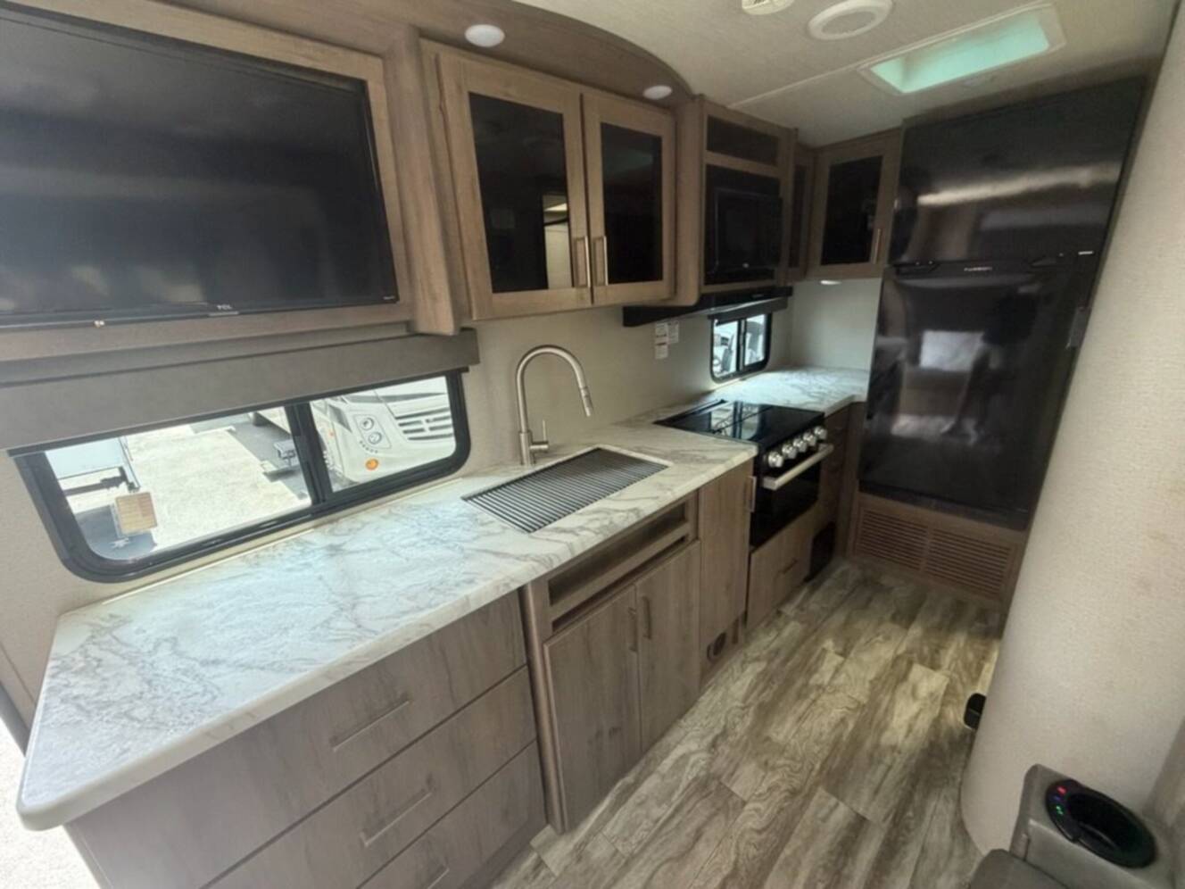 A photo of this 2022 Grand Design Imagine XLS 17MKE