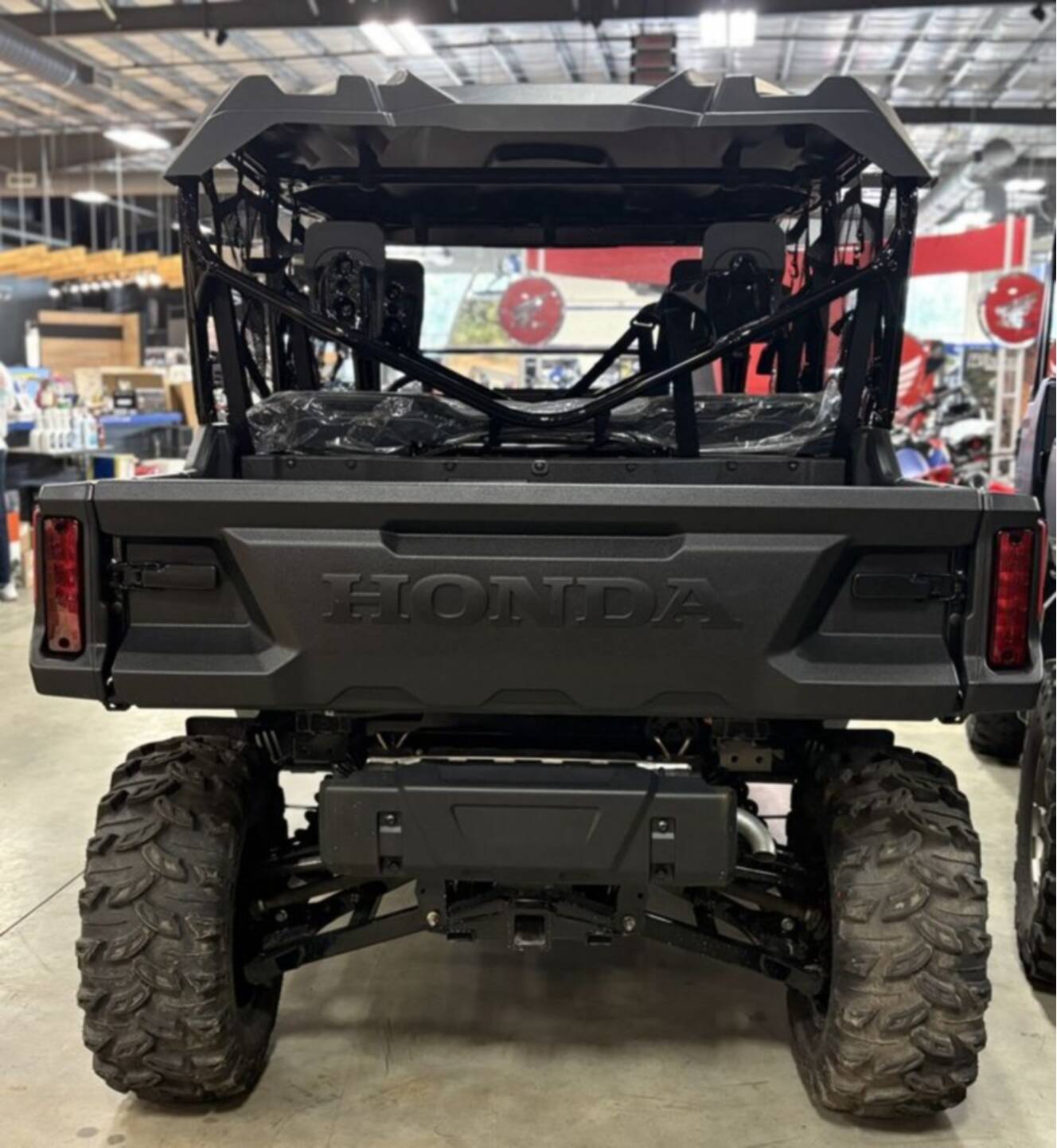 A photo of this 2025 Honda Pioneer 1000-6 Deluxe Crew