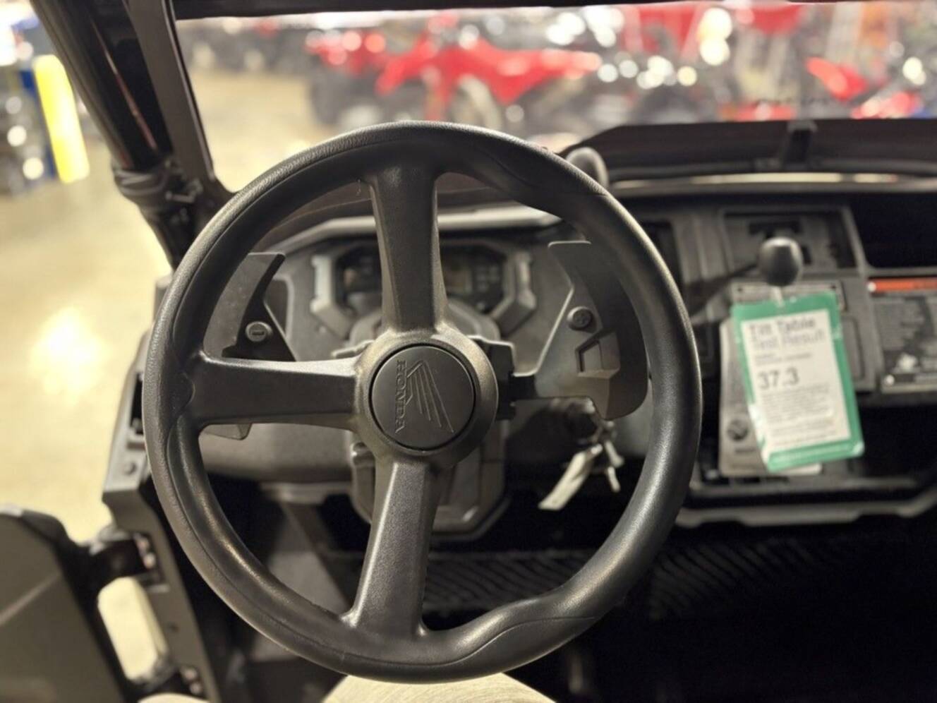 A photo of this 2025 Honda Pioneer 1000-6 Deluxe Crew