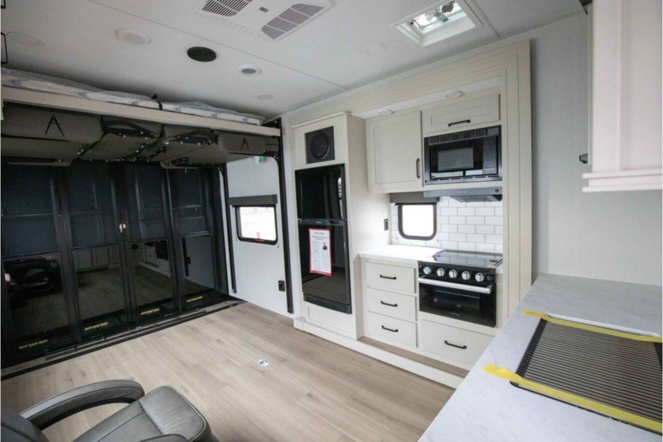 A photo of this 2026 Grand Design MOMENTUM 25G