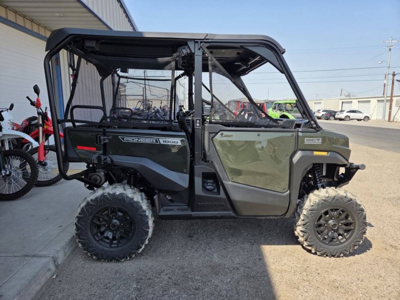A photo of this 2026 Honda® Pioneer 1000-5 Deluxe