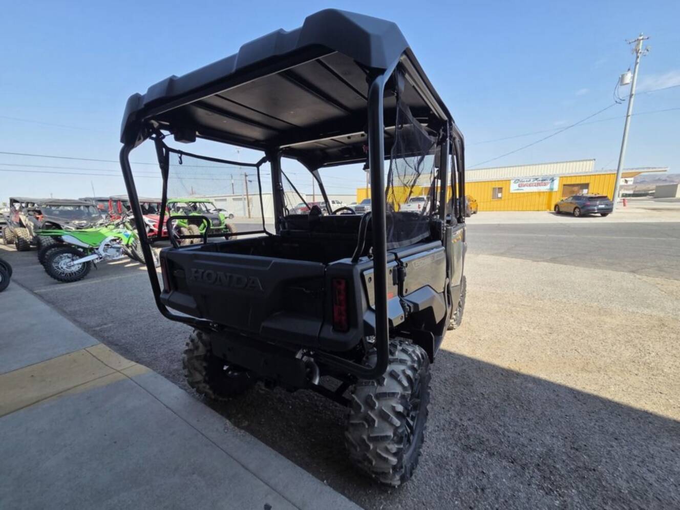 A photo of this 2026 Honda® Pioneer 1000-5 Deluxe