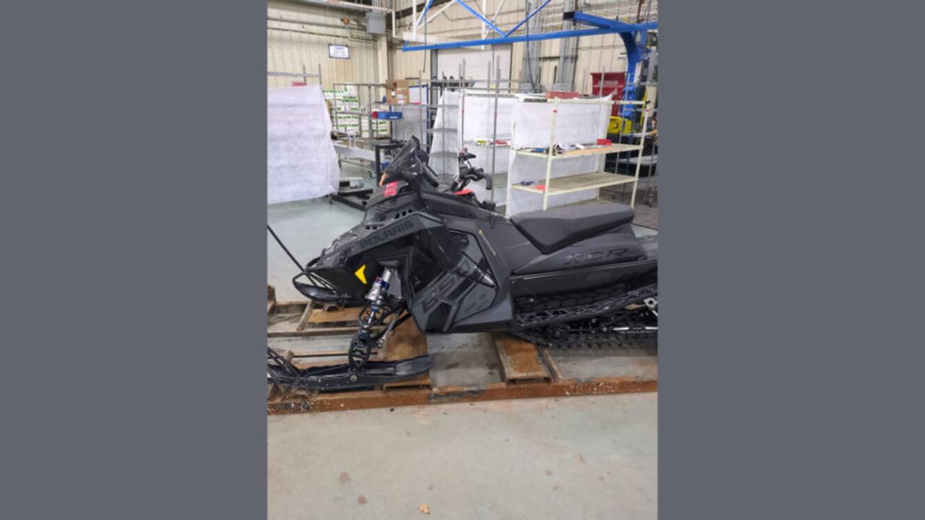 A photo of this 2025 Polaris® 650 Indy XCR 128 Storm Gray / Neon