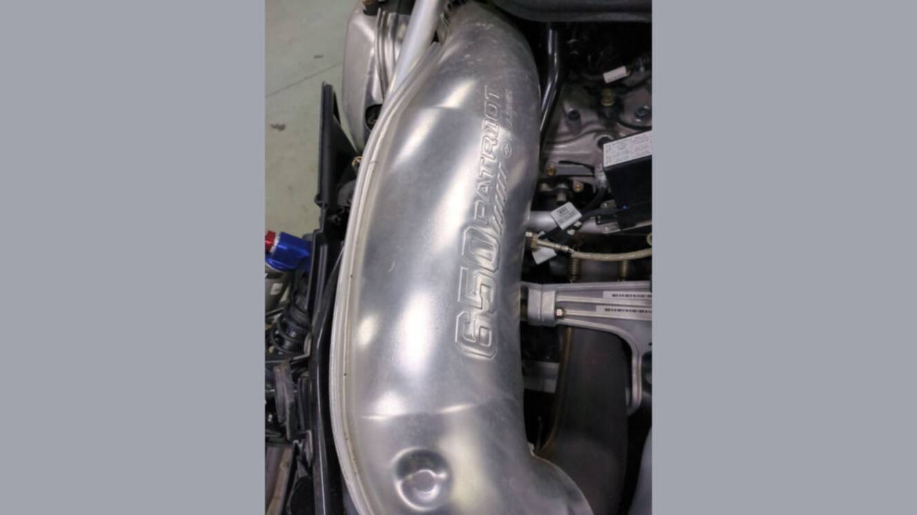 A photo of this 2025 Polaris® 650 Indy XCR 128 Storm Gray / Neon