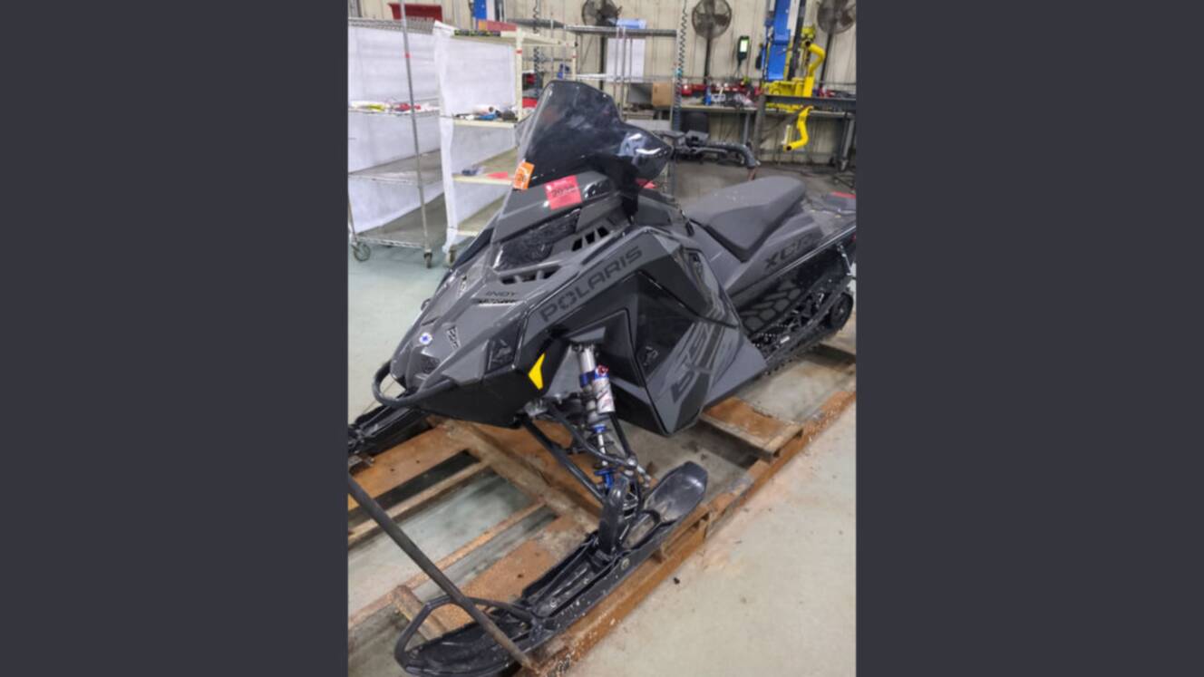 A photo of this 2025 Polaris® 650 Indy XCR 128 Storm Gray / Neon