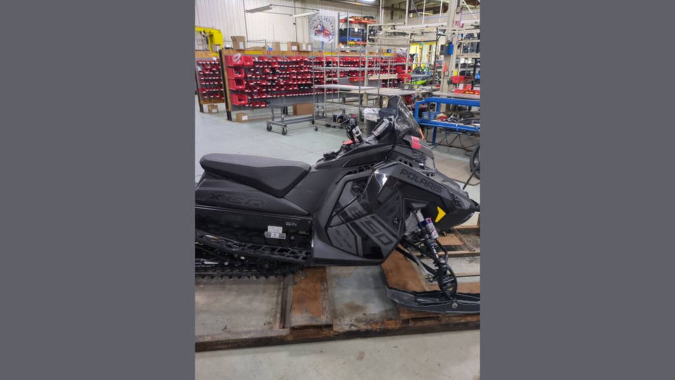 A photo of this 2025 Polaris® 650 Indy XCR 128 Storm Gray / Neon
