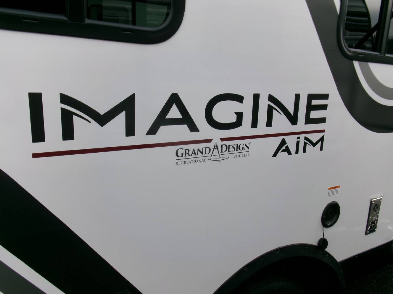 A photo of this 2026 Grand Design Imagine AIM 16MLA