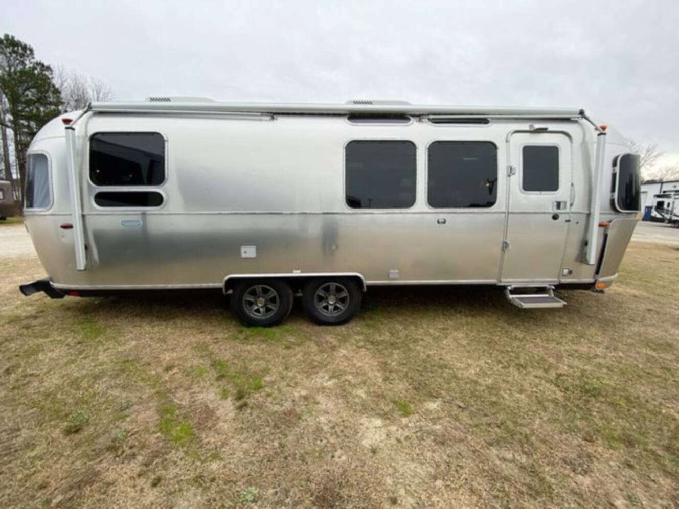 A photo of this 2024 Airstream Pottery Barn 28RBQ