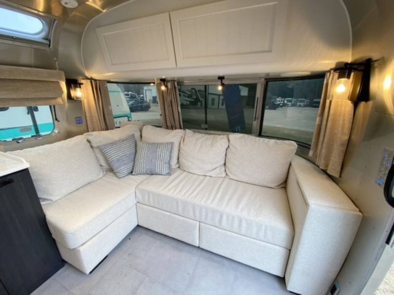 A photo of this 2024 Airstream Pottery Barn 28RBQ