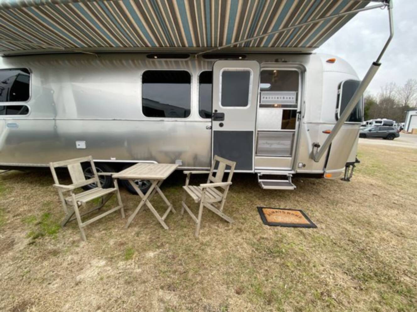 A photo of this 2024 Airstream Pottery Barn 28RBQ