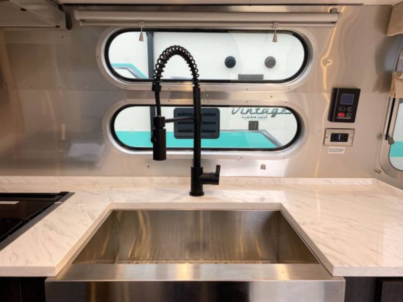 A photo of this 2024 Airstream Pottery Barn 28RBQ